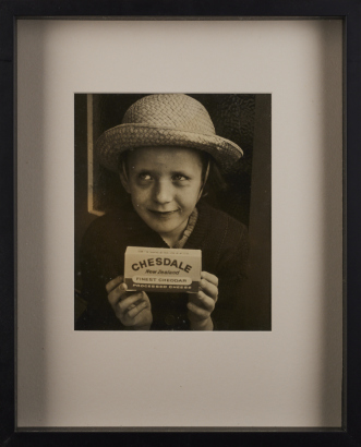 A Photograph of a Person Holding a Block of Cheesedale Cheese