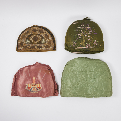 A Collection of Four Vintage Tea Cosies