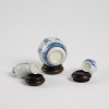 A set of three Chinese Qing dynasty blue and white small vases - 2