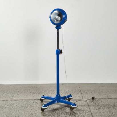 A Vintage Blue Industrial Rolling Floor Lamp