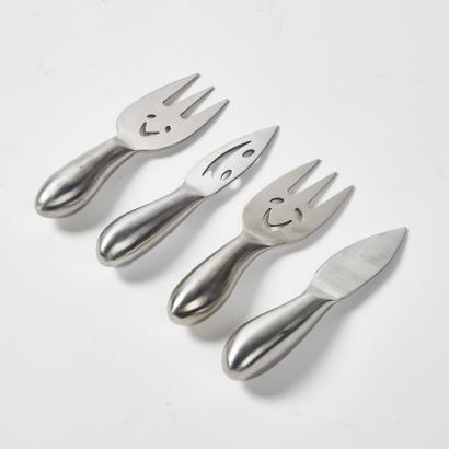 A Collection Of Four Fun Cheese Knives