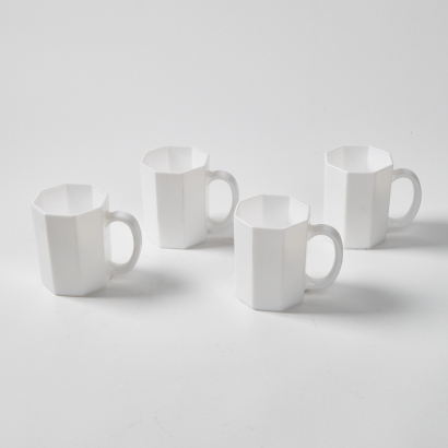 A Set Of Four Retro Hexagonal Coffee Cups