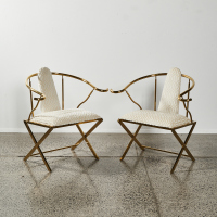 A Pair Of 1970s Horse-Shoe Backed Chairs