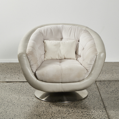 A Contemporary Swivel Tub Chair