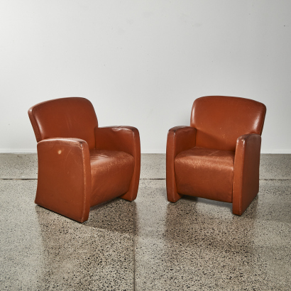 A Pair Of New Zealand Made Leather Tube Chairs