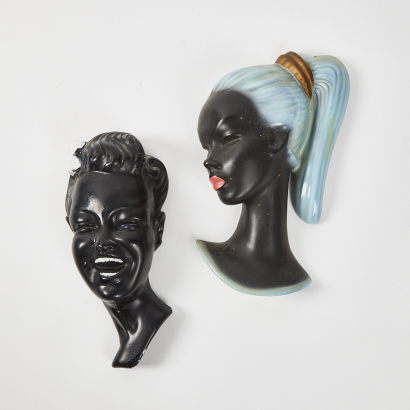 A Pair Of Ceramic Bust Wall Hangings