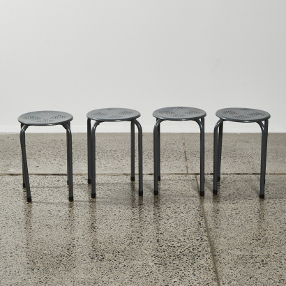 A Collection Of Four Minimal Metal Stools