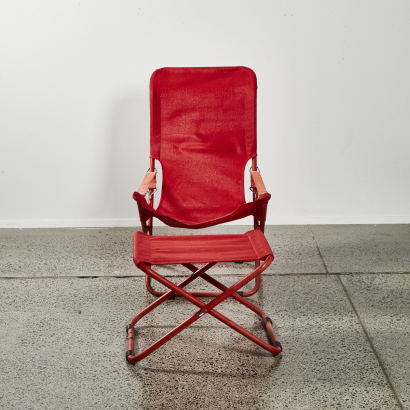 An Italian Fiesta Folding Armchair By Fiam With Footstool