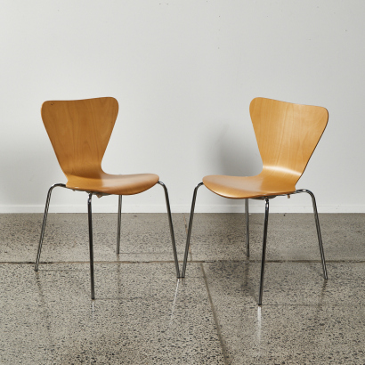 A Pair Of Formed Plywood Chairs