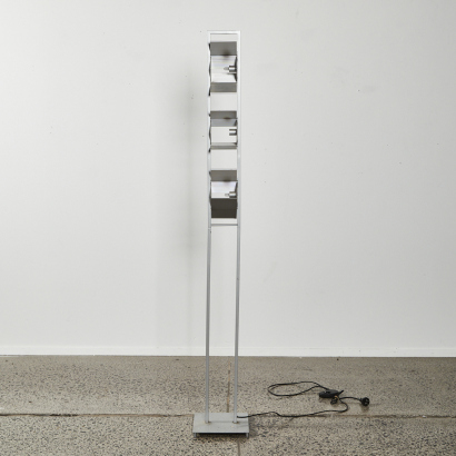 A Contemporary Floor Lamp With Adjustable Fins