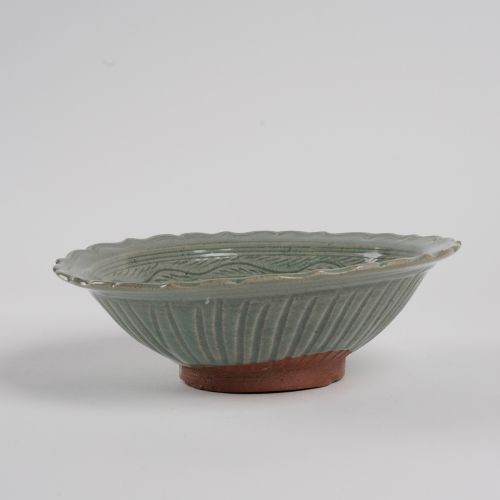 A large Chinese late Yuan-early Ming dynasty Longquan celadon-glazed bowl