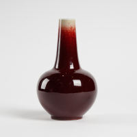 A Chinese early 20C red-glazed Tianqiuping