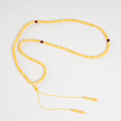 A Chinese beeswax bead necklace