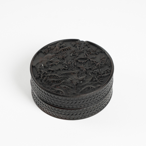 A Chinese Qing dynasty Huanghuali 'Phoenix and Flower' round box
