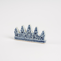 A Chinese Ming dynasty style blue and white pen holder in mountain shape