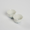 A pair of Chinese Qing dynasty blue and white 'eggshell' cups