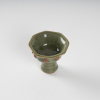 A Chinese Yuan dynasty Longquan celadon-glazed 'figural' octagonal cup - 2