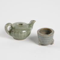 A Chinese Ming dynasty Longquan celadon-glazed water dropper and an incense burner