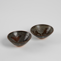 A set of two Chinese Jizhou kiln 'deer and butterfly' tea bowls