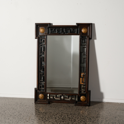 A Chinese wooden frame mirror