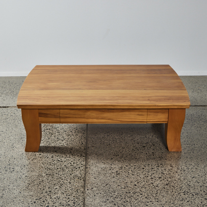 A Wooden Coffee Table with a Sliding Drawer