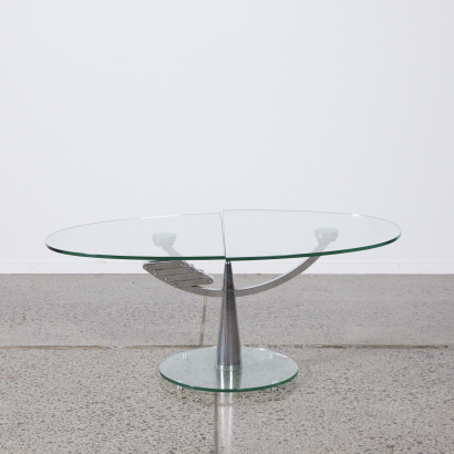 A Glass Coffee Table with a Chrome Base in The Style of Georg Appelshauser