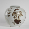 A Korean late 19C-early 20C rust-painted 'Flower' large jar