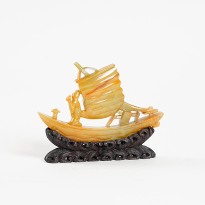 A Chinese yellow jade sailboat ornament