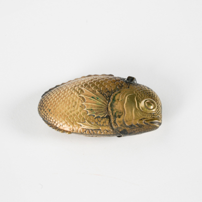 A late 19C-early 20C brass 'carp' match safe, Japan