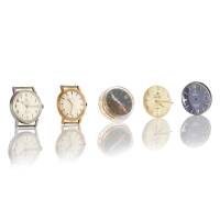 An Interesting Lot of Four Swiss Omega Wristwatch Movements with Extra Parts