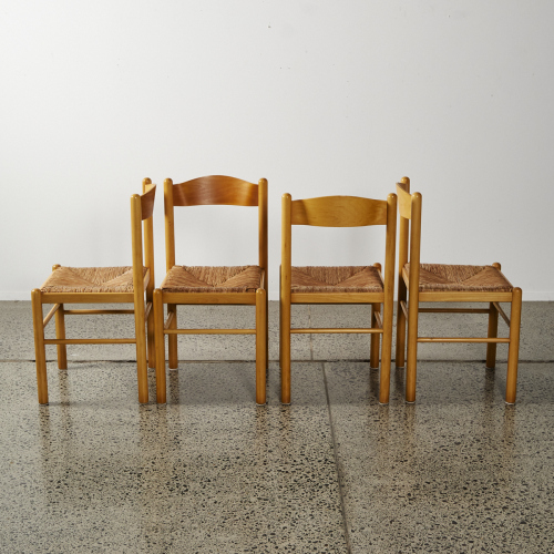 A Set Of Four Italian Made Raffia And Beech Dining Chairs