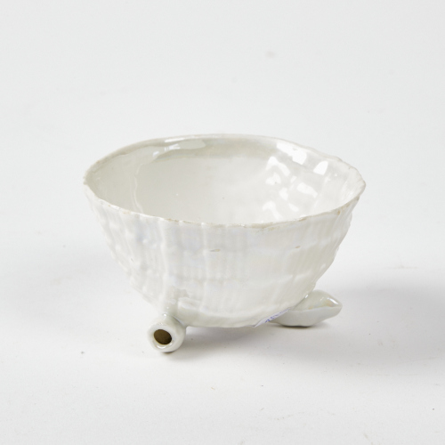 A Footed Ceramic Shell Bowl With Iridescent Glaze