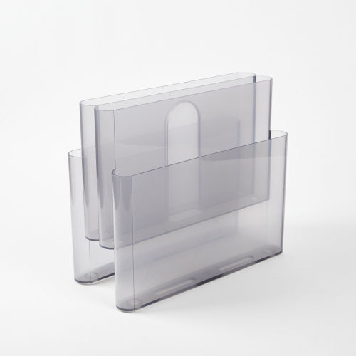 A Kartell Magazine Holder By Giotto Stoppino