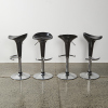 A Set Of Four Bombs Style Stools