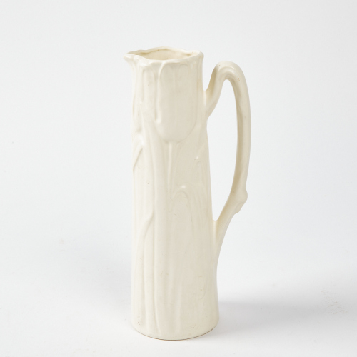 A Crown Lynn Slip Cast Tulip Jug With Twig Handle