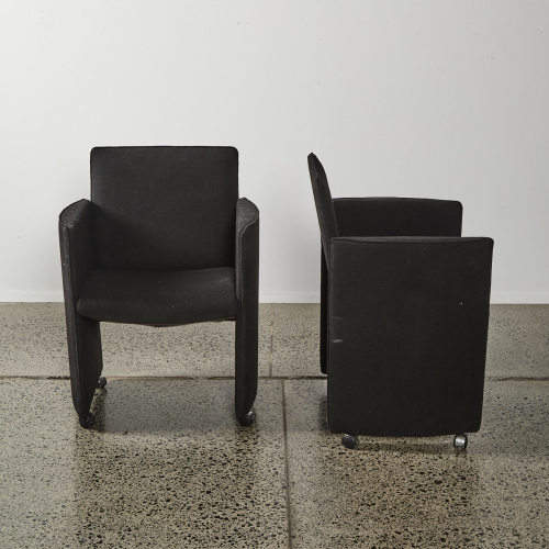 A Pair Of Cassina Style Chairs In Black Upholstery