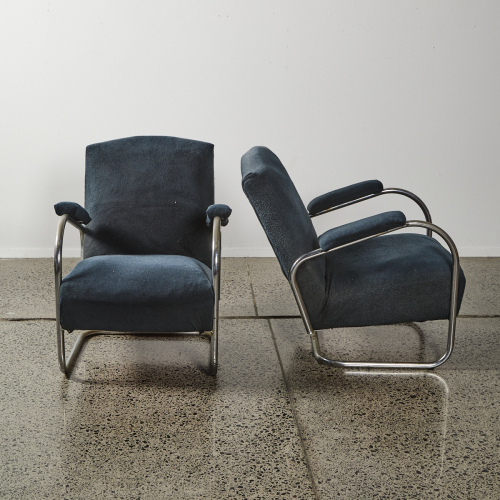 A Pair Of Mid-Century Chrome Cantilevered Chairs