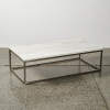 A Marble Topped Coffee Table With A Stainless Steel Base - 2