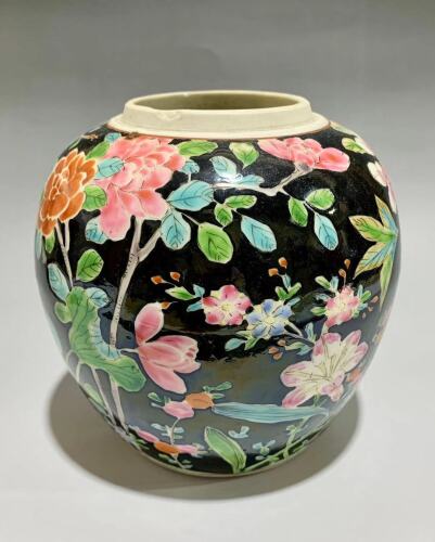 A Chinese Black Ground Famille Rose Jar