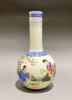 A Chinese Famille Rose Vase decorated with figures (Qianlong Mark)