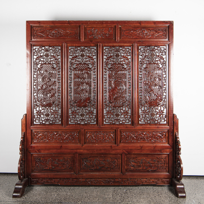 A Chinese wood carved ‘ flowers' floor screen