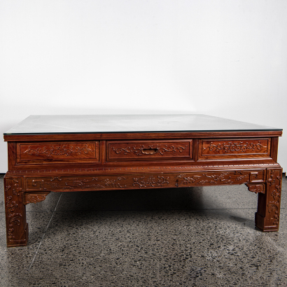 A Chinese hardwood carved "flower" square table