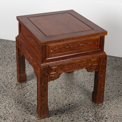 A Chinese hardwood carved "flower" square table