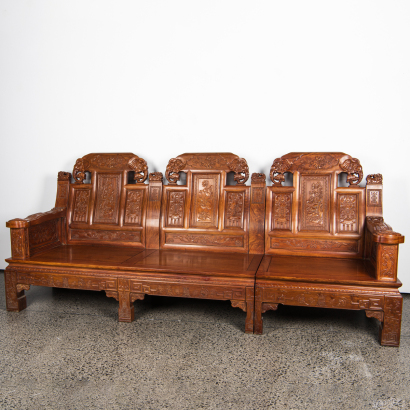 A Chinese hardwood carved 'Ruyi '2+1 three-seater armchair