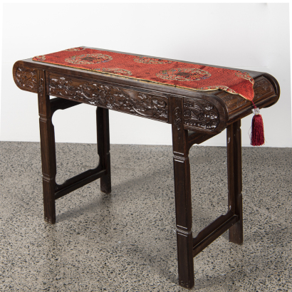 A Chinese hardwood carved 'bats' long table