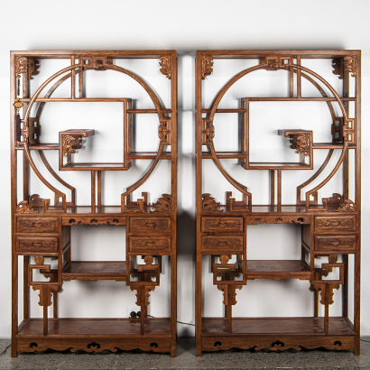 A pair of Chinese hardwood carved display shelves