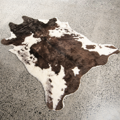 A large cowhide style rug