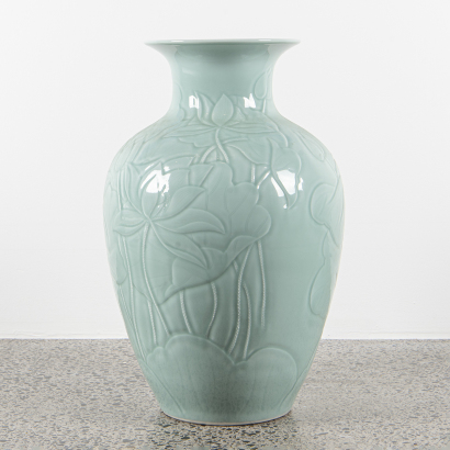 A Chinese carved celadon-glazed large vase