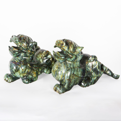 A pair of Jade carved mythical beast ornaments