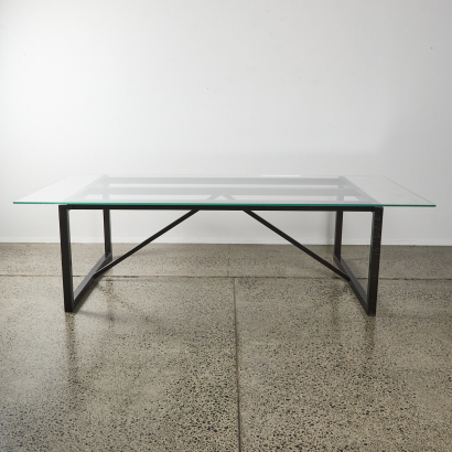 A Glass Topped Dining Table